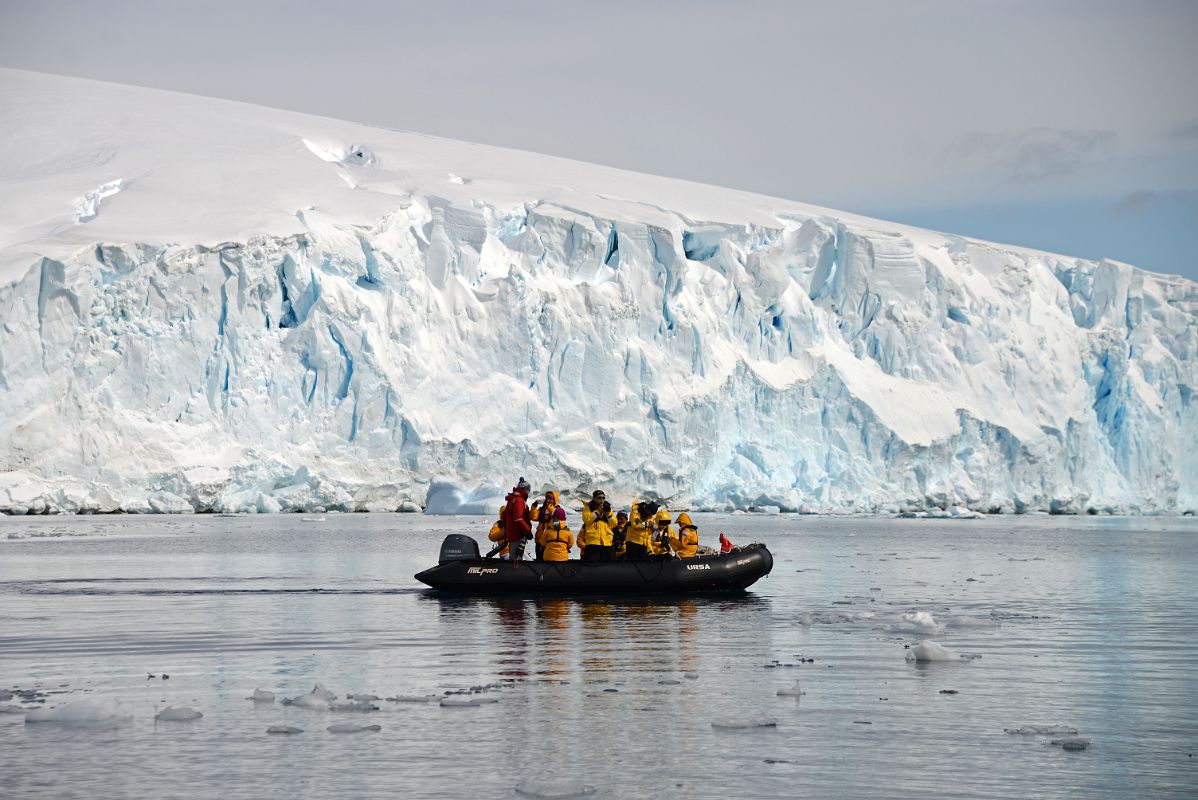 19A Zodiac With Steep Glacier Behind At Cuverville Island On Quark Expeditions Antarctica Cruise